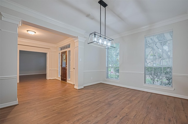 1902 Rosebay Ct, Sugar Land, TX 77479 - unfurnished dining area featuring a chandelier, wood finished floors, and ornamental molding