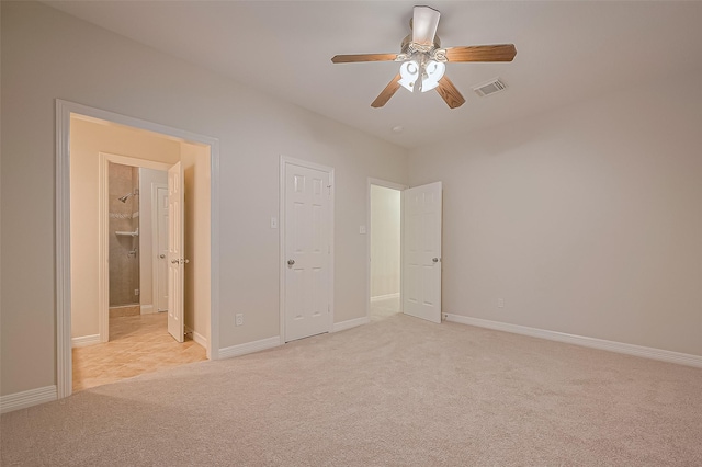 1902 Rosebay Ct, Sugar Land, TX 77479 - unfurnished bedroom with light colored carpet and a ceiling fan