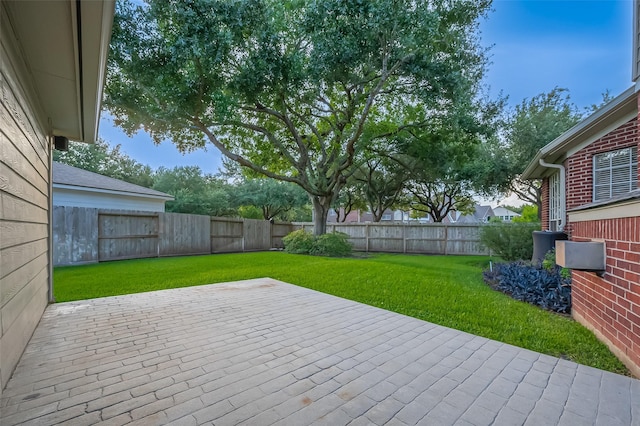 1902 Rosebay Ct, Sugar Land, TX 77479 - fenced backyard with a patio