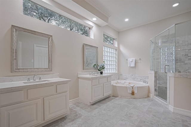 1902 Rosebay Ct, Sugar Land, TX 77479 - full bath featuring a garden tub, a stall shower, two vanities, ornamental molding, and recessed lighting