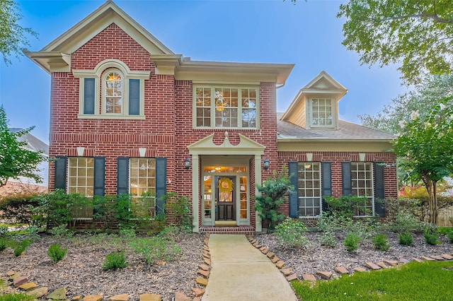 1902 Rosebay Ct, Sugar Land, TX 77479 - georgian-style home featuring brick siding and a shingled roof