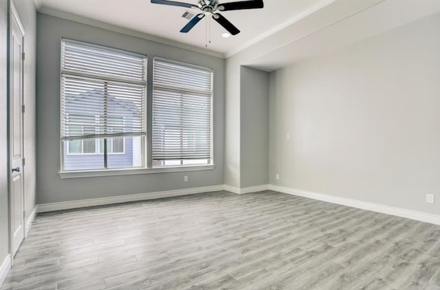 8907 Spring Knoll Forest Dr, Houston, TX 77080 - empty room with ornamental molding, light wood-style floors, and a ceiling fan