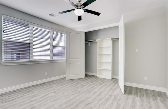 8907 Spring Knoll Forest Dr, Houston, TX 77080 - unfurnished bedroom featuring wood finished floors, a closet, and ceiling fan