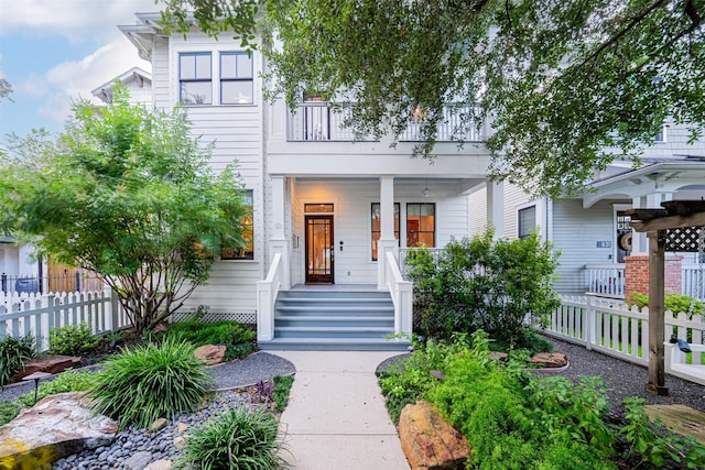 829 Ralfallen St, Houston, TX 77008 - view of front facade featuring a balcony and covered porch