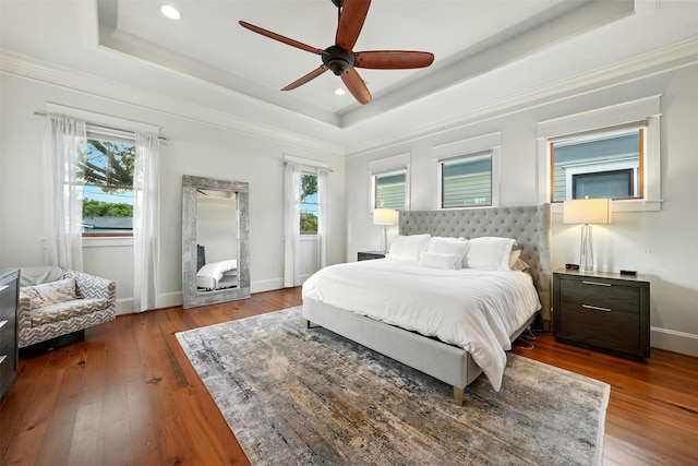 829 Ralfallen St, Houston, TX 77008 - bedroom with a raised ceiling, hardwood / wood-style flooring, recessed lighting, ceiling fan, and ornamental molding