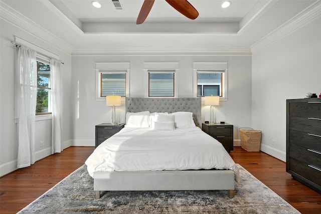 829 Ralfallen St, Houston, TX 77008 - bedroom featuring a raised ceiling, dark wood-style flooring, ceiling fan, recessed lighting, and ornamental molding