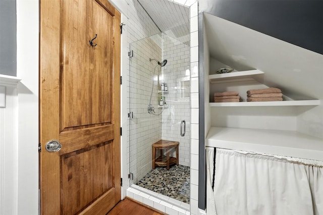 829 Ralfallen St, Houston, TX 77008 - bathroom with a stall shower and wood finished floors