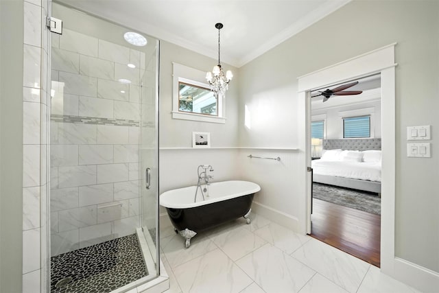 829 Ralfallen St, Houston, TX 77008 - bathroom with marble look tiles, a freestanding tub, crown molding, a shower stall, and a chandelier