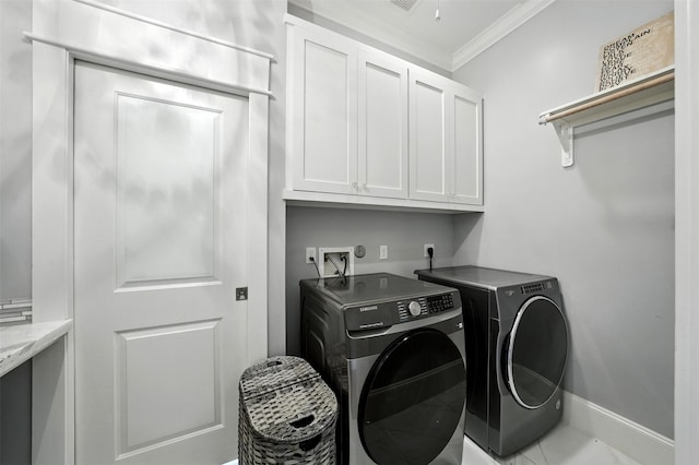829 Ralfallen St, Houston, TX 77008 - laundry room with cabinet space, crown molding, and washing machine and dryer