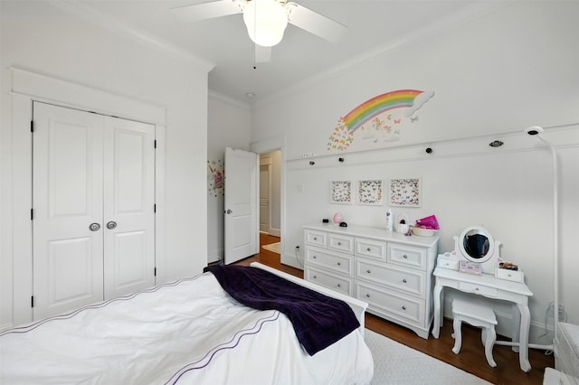 829 Ralfallen St, Houston, TX 77008 - bedroom featuring ornamental molding, dark wood finished floors, a closet, and a ceiling fan