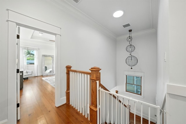 829 Ralfallen St, Houston, TX 77008 - hallway with an upstairs landing, crown molding, and wood finished floors