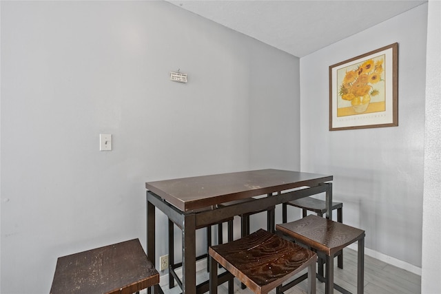 1805 19th St, Galveston, TX 77550 - dining area with baseboards and light wood-type flooring