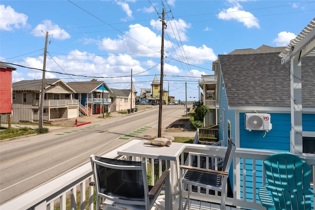 1805 19th St, Galveston, TX 77550 - view of asphalt road with a residential view, sidewalks, and curbs