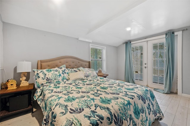 1805 19th St, Galveston, TX 77550 - bedroom with french doors, access to outside, and wood finished floors