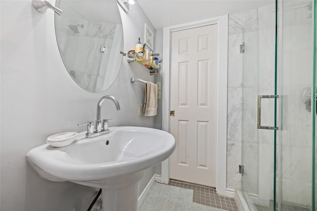 1805 19th St, Galveston, TX 77550 - bathroom featuring a shower stall and tile patterned floors