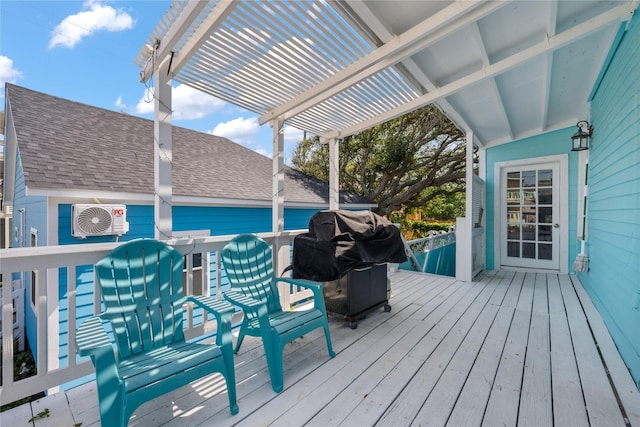 1805 19th St, Galveston, TX 77550 - wooden terrace with a pergola and area for grilling