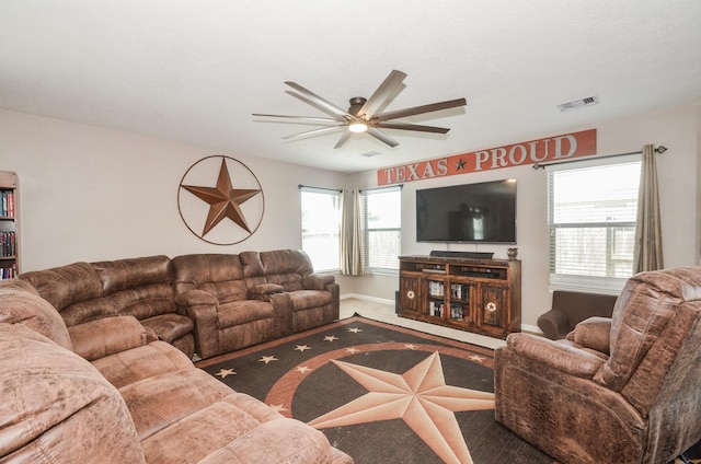 22218 Woodseem Ct, Katy, TX 77449 - living room with a ceiling fan and carpet floors