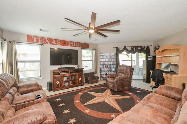22218 Woodseem Ct, Katy, TX 77449 - living room featuring ceiling fan, plenty of natural light, and an office area