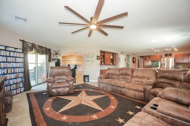 22218 Woodseem Ct, Katy, TX 77449 - carpeted living room featuring a ceiling fan