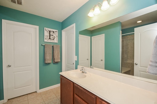 22218 Woodseem Ct, Katy, TX 77449 - full bathroom with vanity, tile patterned floors, and tiled shower