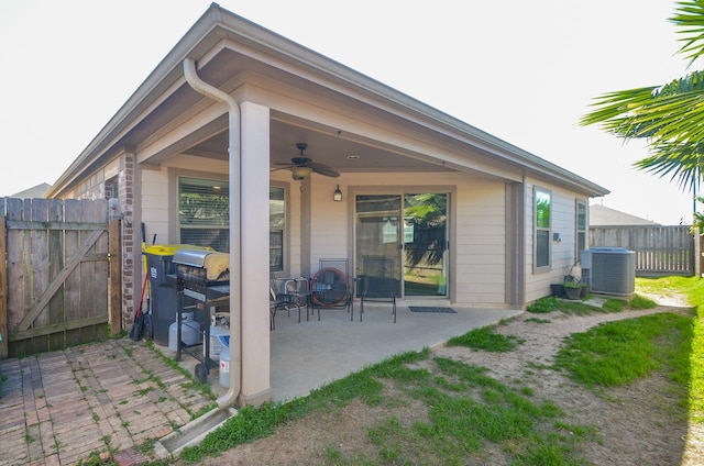22218 Woodseem Ct, Katy, TX 77449 - view of patio featuring a ceiling fan and a gate