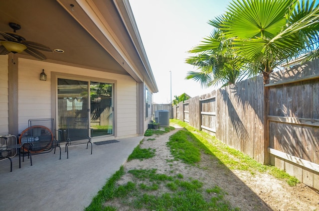 22218 Woodseem Ct, Katy, TX 77449 - view of yard with ceiling fan and a patio