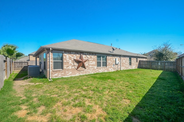 22218 Woodseem Ct, Katy, TX 77449 - rear view of house featuring brick siding and a fenced backyard