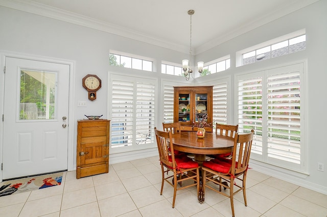 2014 Shadow Forest Dr, Katy, TX 77494 - dining room featuring light tile patterned flooring, ornamental molding, and a chandelier