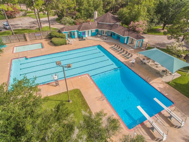 2014 Shadow Forest Dr, Katy, TX 77494 - community pool featuring a diving board and a patio