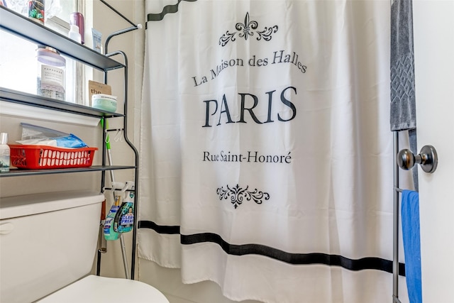 7307 Sunlight Ln, Houston, TX 77095 - bathroom featuring toilet and a shower with shower curtain