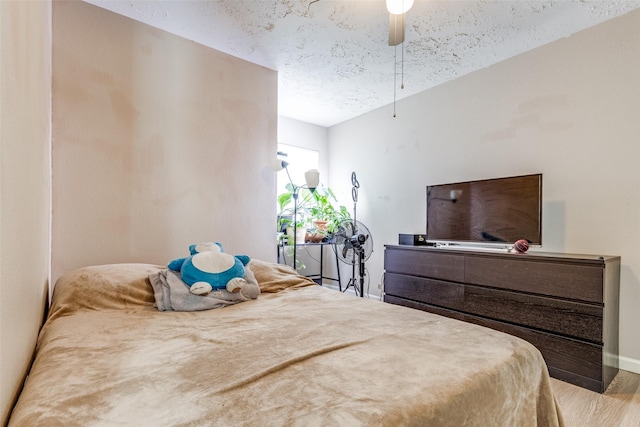 7307 Sunlight Ln, Houston, TX 77095 - bedroom featuring wood finished floors and ceiling fan