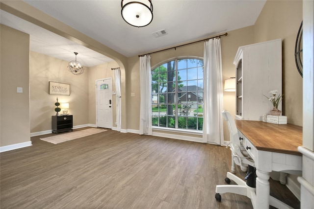 18219 Water Mill Dr, Cypress, TX 77429 - entrance foyer featuring a chandelier and wood finished floors