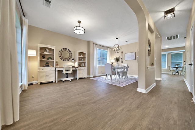 18219 Water Mill Dr, Cypress, TX 77429 - entryway featuring plenty of natural light, wood finished floors, and a chandelier