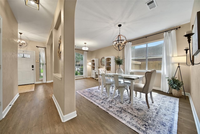 18219 Water Mill Dr, Cypress, TX 77429 - dining room featuring a chandelier and wood finished floors