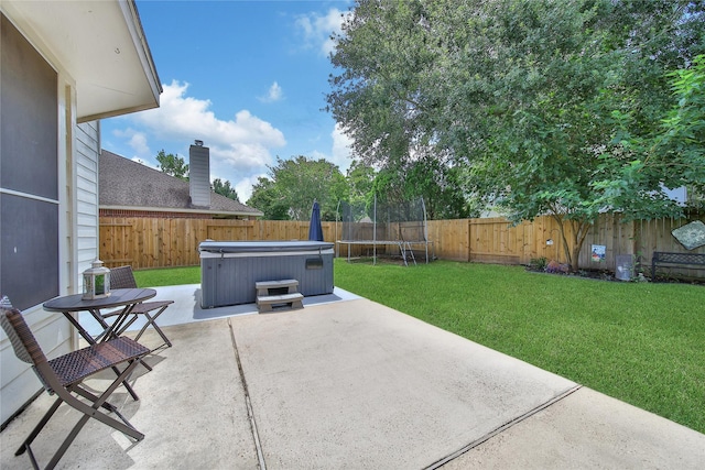 18219 Water Mill Dr, Cypress, TX 77429 - fenced backyard featuring a patio and a hot tub