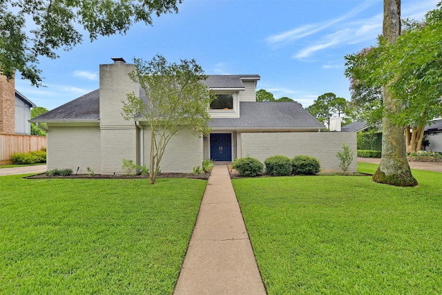 3510 Ledgestone Dr, Houston, TX 77059 - mid-century home featuring a chimney and a shingled roof