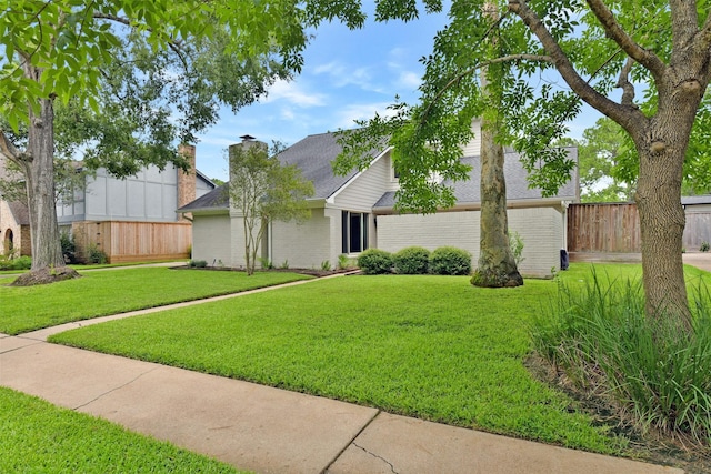 3510 Ledgestone Dr, Houston, TX 77059 - view of front facade featuring brick siding, roof with shingles, and a chimney