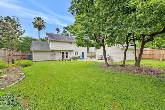 3510 Ledgestone Dr, Houston, TX 77059 - back of property featuring french doors, a fenced backyard, and a shingled roof