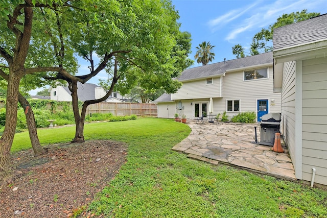 3510 Ledgestone Dr, Houston, TX 77059 - view of yard featuring french doors and a patio area