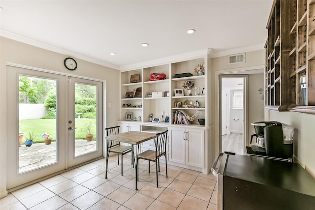 3510 Ledgestone Dr, Houston, TX 77059 - dining area with crown molding, french doors, light tile patterned floors, and recessed lighting