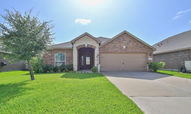 21015 Echo Manor Dr, Hockley, TX 77447 - french country inspired facade featuring brick siding, driveway, a garage, a front lawn, and roof with shingles