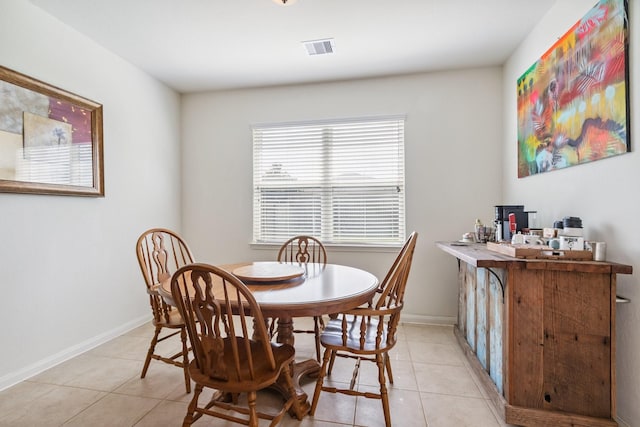 21015 Echo Manor Dr, Hockley, TX 77447 - dining room featuring light tile patterned flooring and baseboards