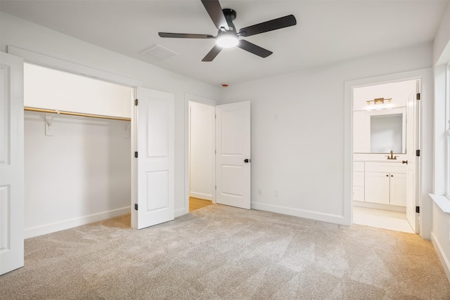 882 Prosper St, Houston, TX 77088 - unfurnished bedroom featuring light colored carpet, a closet, ensuite bath, and a ceiling fan