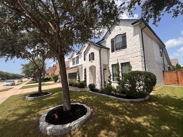10214 Texas Sage Way, Cypress, TX 77433 - french country style house featuring stone siding