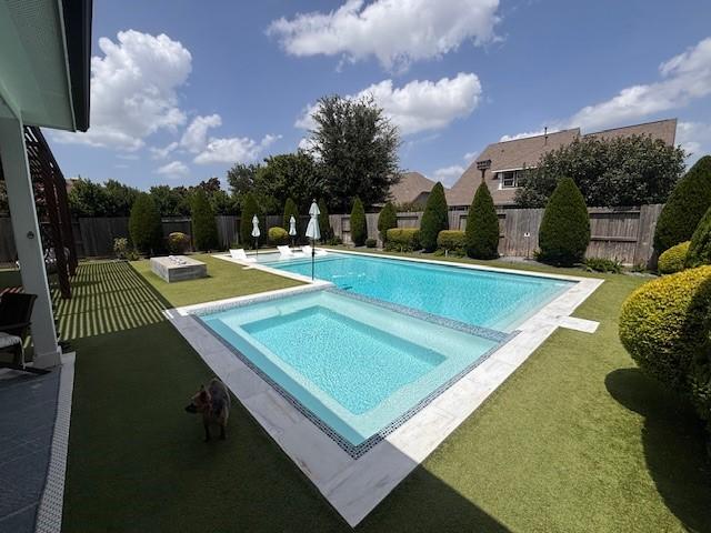 10214 Texas Sage Way, Cypress, TX 77433 - view of swimming pool featuring a fenced backyard and a pool with connected hot tub