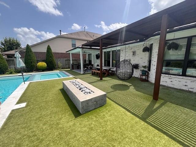 10214 Texas Sage Way, Cypress, TX 77433 - view of pool with a fenced backyard, a patio, and an outdoor fire pit
