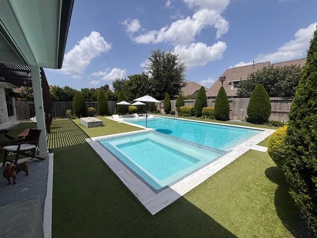 10214 Texas Sage Way, Cypress, TX 77433 - view of swimming pool featuring a fenced backyard, a patio, and a pool with connected hot tub