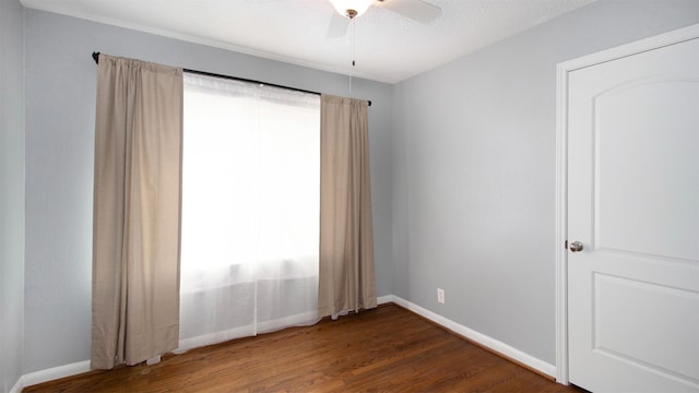 8106 Montridge Dr, Houston, TX 77055 - spare room featuring dark wood finished floors and ceiling fan