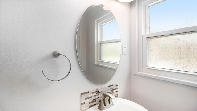 8106 Montridge Dr, Houston, TX 77055 - bathroom with tasteful backsplash and healthy amount of natural light