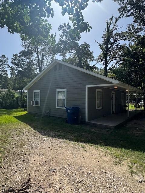 380 Rae Ann Blvd, Livingston, TX 77351 - view of property exterior with a lawn